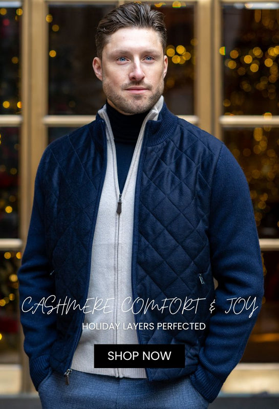 man in cashmere jacket in navy, copy reads: Cashmere, comfort & joy.  shop now