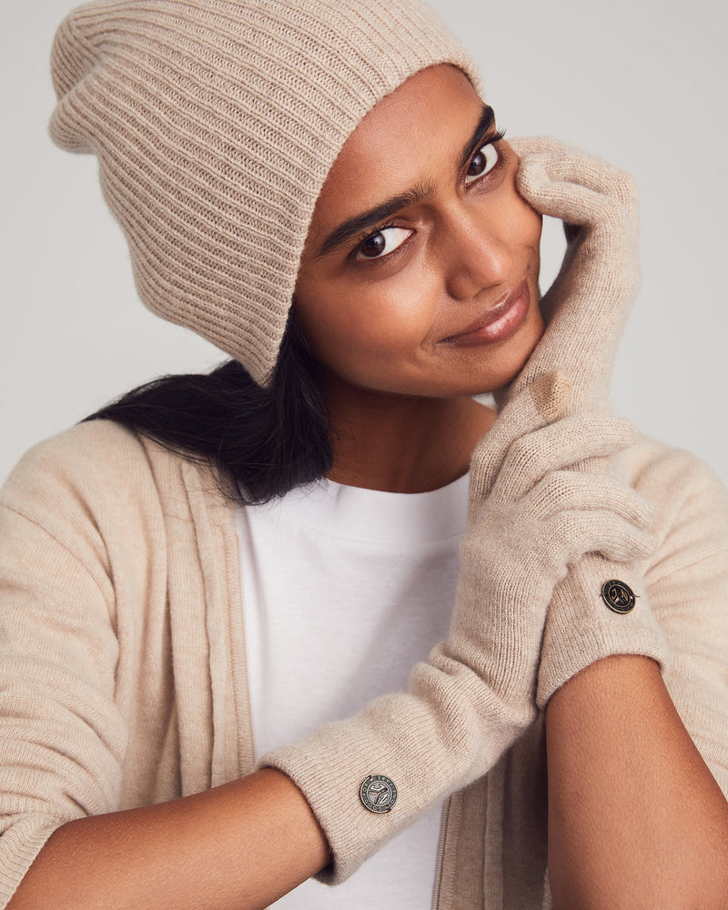 Model wearing hat in Sand/Camel