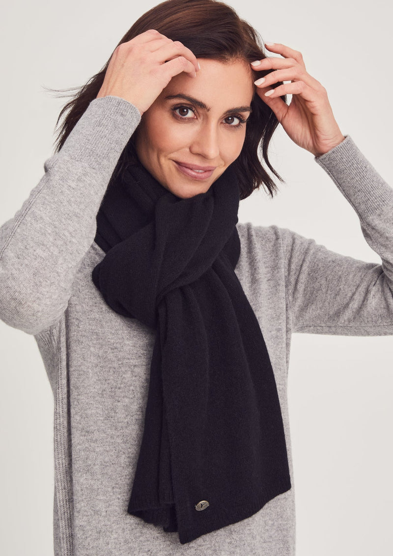 Woman wearing Kennedy Travel Wrap in Black