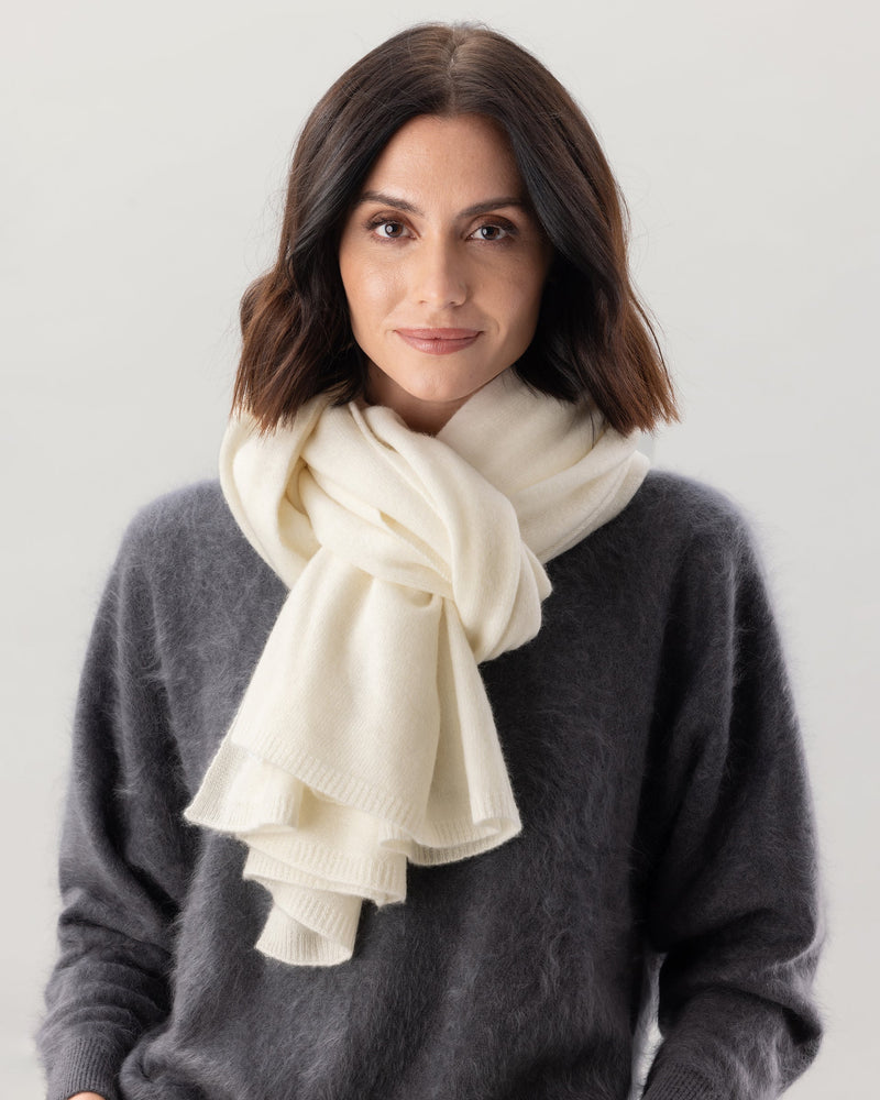 Woman wearing Kennedy Travel wrap in Ivory