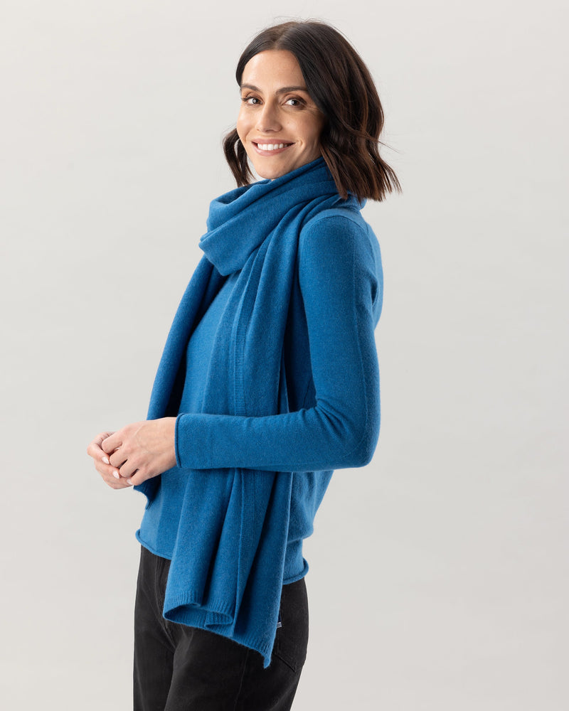 Woman wearing Kennedy Travel wrap in Teal