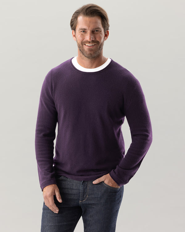 Man wearing Nomad Sweater in Currant