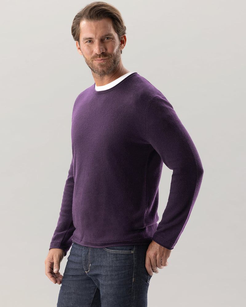 Man wearing Nomad Sweater in Currant