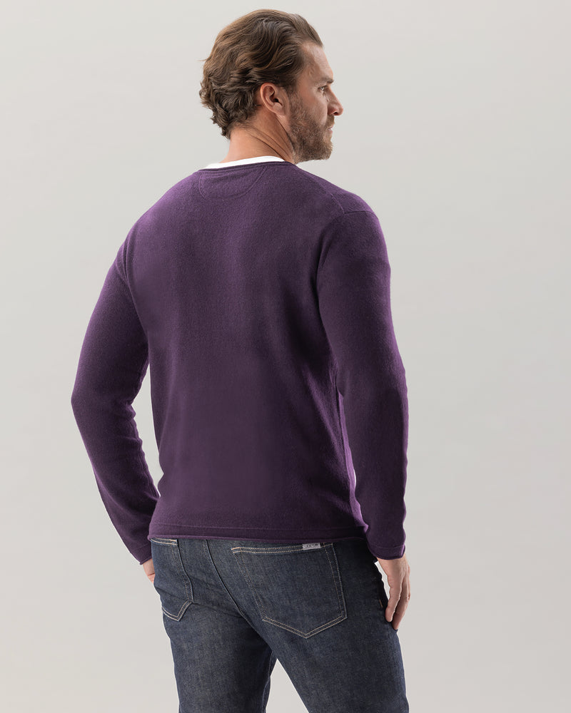 Man wearing Nomad Sweater in Currant