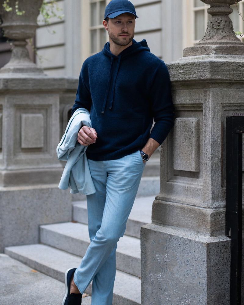 man wearing Kobre Cashmere Hoodie in Midnight