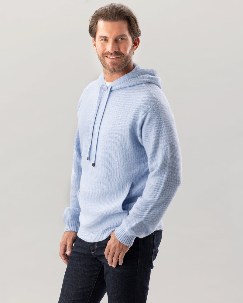 Man wearing Cadman sweater in Ice Blue