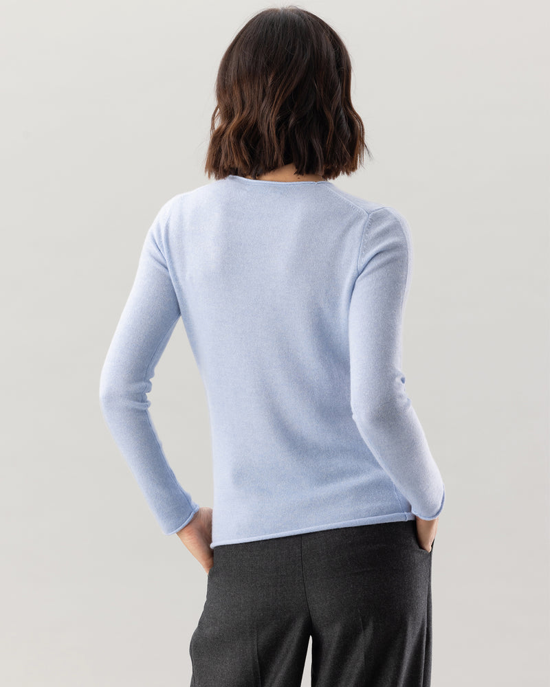 Woman wearing Nomad Sweater in Ice Blue