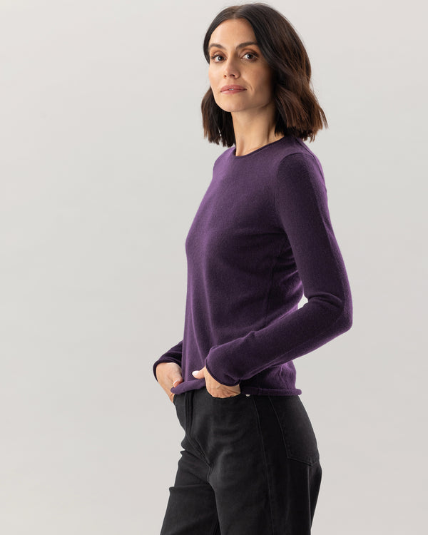 Woman wearing Nomad Sweater in Currant
