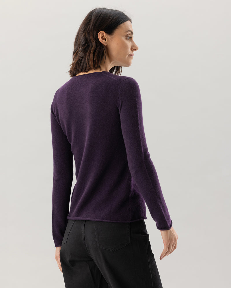 Woman wearing Nomad Sweater in Currant