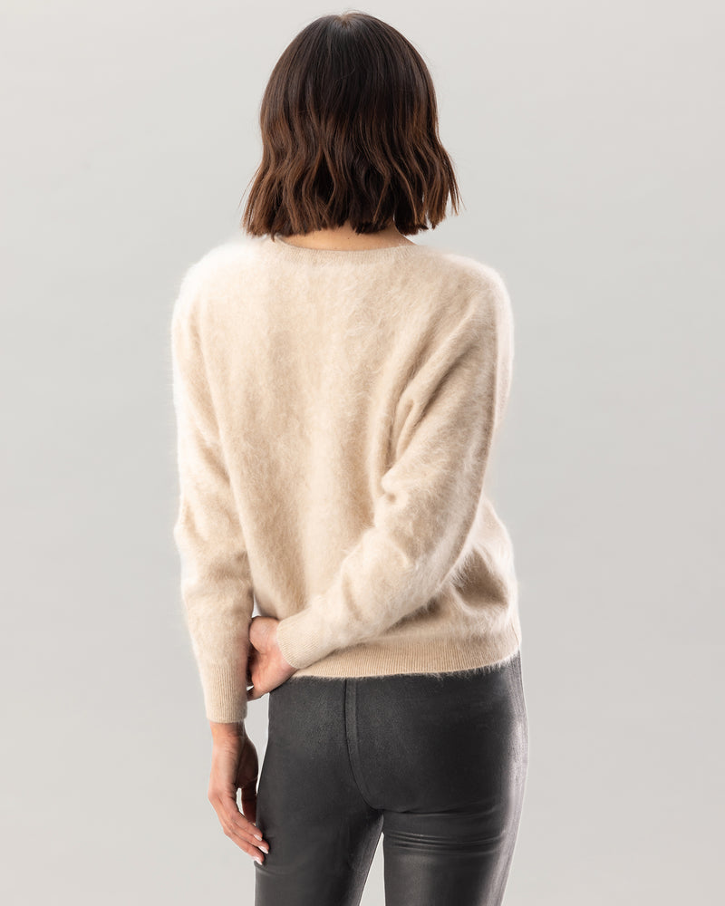 Model wearing Sedgwick Sweater in latte back view