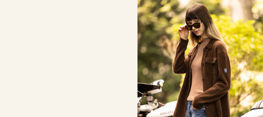 young female wearing cashmere Deegan shirt jacket in brown