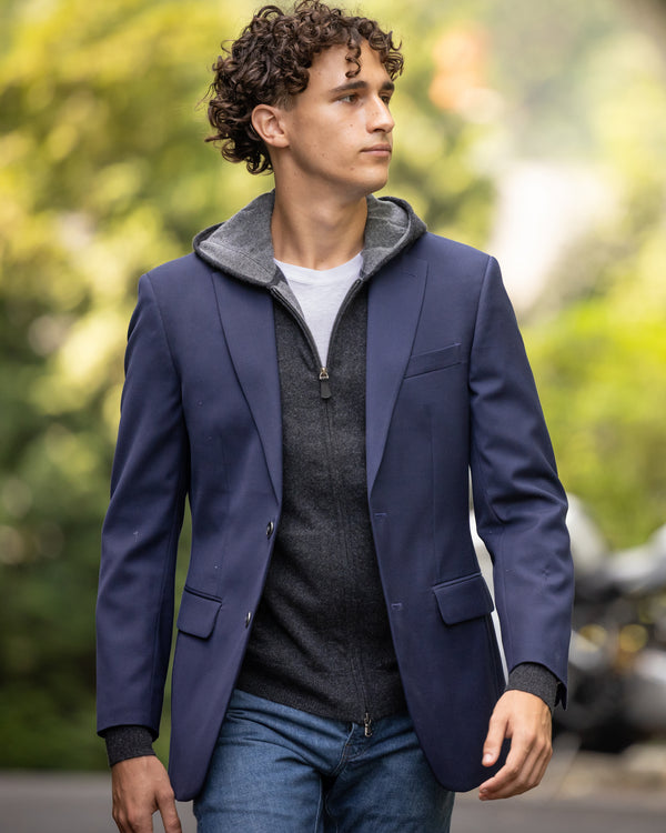 Man Wearing navy blazer and Stuyvesant Zip Hoodie in Charcoal