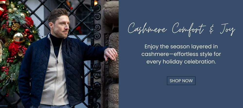 man in cashmere jacket in navy, copy reads: Cashmere, comfort & joy. Enjoy the season layered in cashmere, effortless style for every holiday celebration. shop now