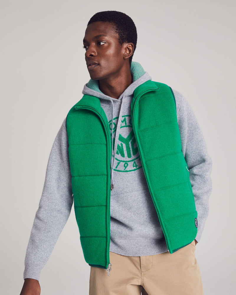 Man wearing Fordham Quilted Vest in Kelly Green