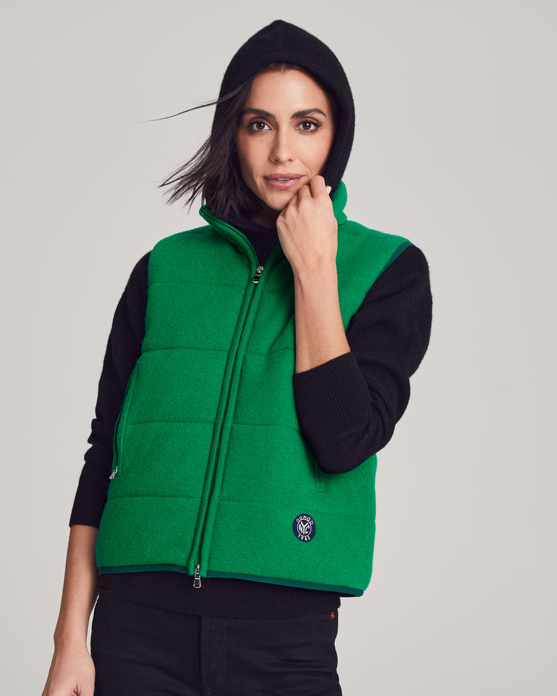 Woman wearing Magnolia Quilted Vest in Kelly Green