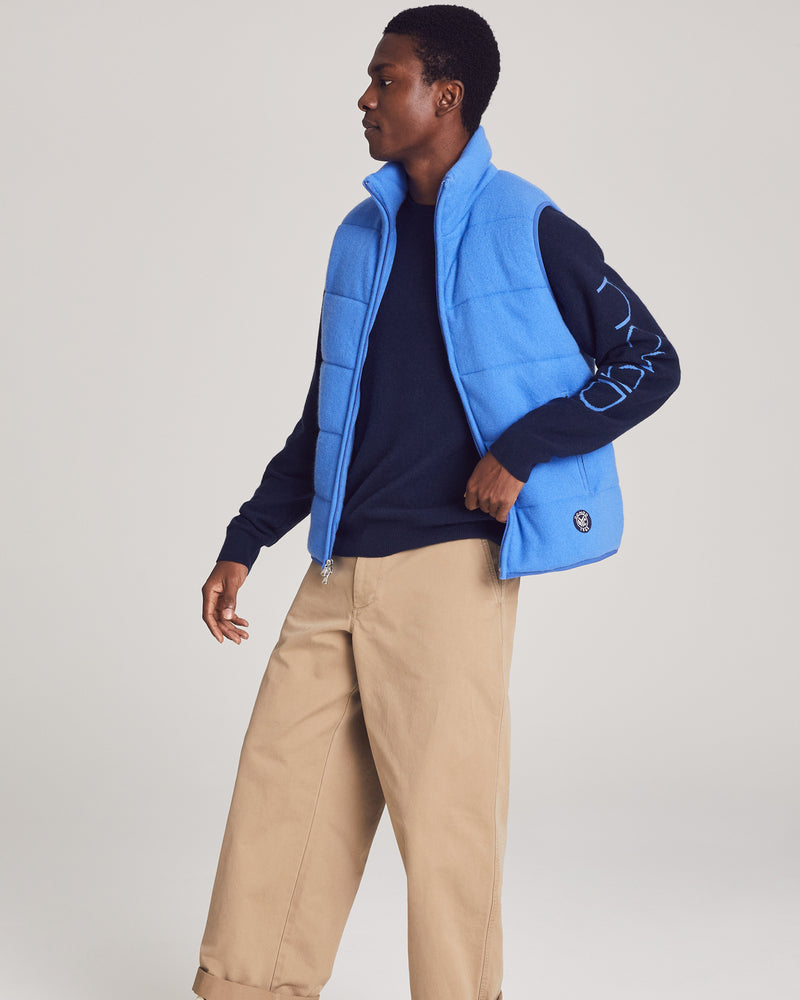 Man wearing Fordham Quilted Vest in Cobalt