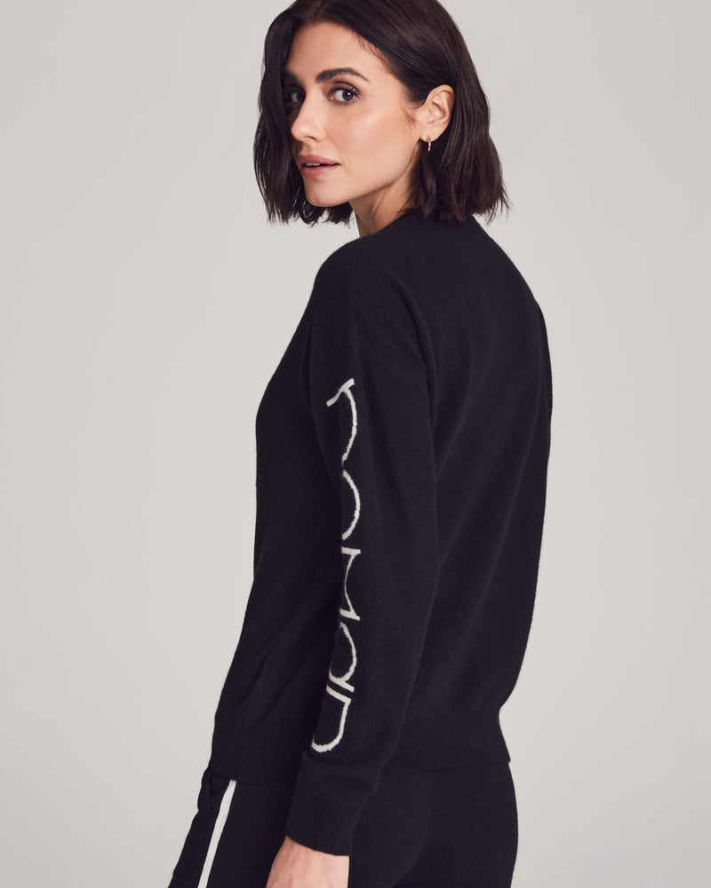 Woman wearing Hewitt Sweater in Black