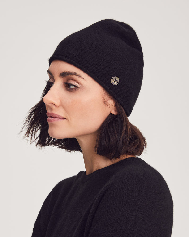 Woman wearing Regina Hat in Black